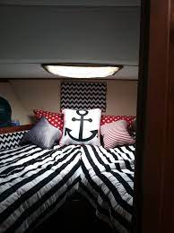 Personalized accessories are a really fun way to add flair to your boat's decor. V Berth Decor Boat Interior Boat Interior Ideas Boat Decor
