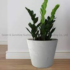 Place a pot with herbs into the watering container and pour in water so that the water level is between the waves on the scale. China Home Decoration Plastic Round Flower Pot Plant Pot With Stone Effect For Indoor And Outdoor Garden Planter China Flower Pot And Plant Pot Price
