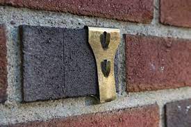 How To Hang Art On Brick And Stone Walls Made Remade Hanging Art Brick And Stone Brick Clips