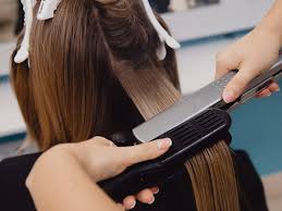 How to straighten curly hair. How To Straighten Your Hair With Less Damage