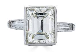 Geometric designs prevailed in art deco rings, so emerald cut diamonds and asscher cut diamonds played a major role in rings from this era. Exceptional Art Deco Emerald Cut Diamond Ring Gray Davis Antique Custom Jewelry