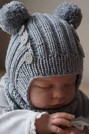 shapochka shlem s pomponami dlya novorozhdennogo spicami opisanie shemy foto svitera vyazanye kryuchkom detskie vyazanye shapki detskoe vyazane