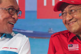 Mahathir, set a retirement date or we'll do it for you: Anwar ally Rafizi 