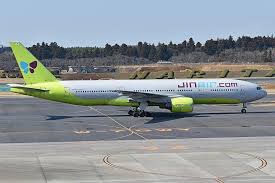 Crew members are expected to not only sport the red ensembles for the entire duration of the flight, but they are also required to wear a red ascot, white leather gloves. Jin Air To Modify One 777 200er For Cargo Only Operations News Flight Global