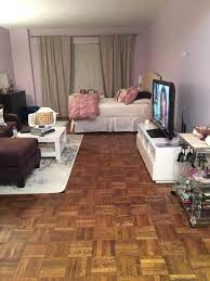 The blank corner is instantly made more welcoming with these thoughtful touches, proving that you don't need to go overboard to fill a corner. Bachelor Apartment Decorating Tips Novocom Top
