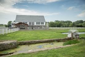 A beautiful ceremony on the lawn at the river's edge, a joyful ceremony in the pavilion. The Barn At Silverstone Lancaster Pa Stable Hollow Construction