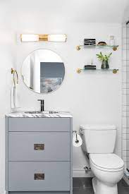 Open shelving can provide an airier atmosphere, but it also requires maintenance and organization as it also serves as a display. Glass Shelves Over Toilet Design Ideas