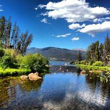 Visitors enjoy the area for its great boating, fishing and hiking opportunities. View Of Shadow Mountain Lake From Colorado Cabin Adventures Best Places To Camp Camping Colorado Colorado Cabins