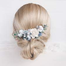 Brides who wish to wear a veil on their wedding day often require hairpieces to keep the veil securely in place, so look for something suitable that suits your look and hairstyle youre. Flower Hair Comb Blue Hair Piece Bridal Hair Clip Wedding Etsy