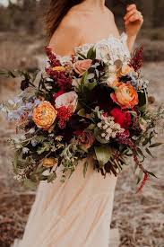 Peonies, roses, tulips, calla lilies, hydrangeas, sweet pea, and ranunculus are just a few of the. Wildflower Wedding Bouquets Autumn Bouquets With Pink Roses Orange Flowers With Greenery A Wildflower Wedding Fall Wedding Bouquets Wedding Flower Arrangements
