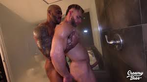 bodybuilder sucks muscle cock under the shower [Video]