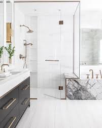 When you have a crisp white bathroom as a backdrop, try dressing it up with some fabulous accessories such as a venetian mirror with intricate detailing. 27 Elegant White Bathroom Ideas To Inspire Your Home Bathroom Interior Bathroom Design Contemporary Bathroom Designs