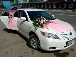 Decorating the bride and groom's getaway car is a tradition that can have humorous results or stylish ones. Creative Car Decoration For Wedding Equipped With Pink Ribbon And Flower Decoration You Can Apply The Whit Wedding Car Wedding Car Decorations Wedding Car Deco