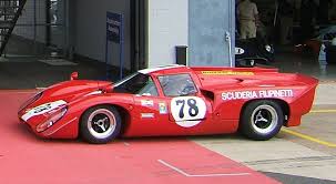 This is a race car, and can't really be compared to a street car. Lola T Pictures Photo 4 Old Race Cars Classic Racing Cars Classic Sports Cars