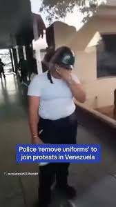 Police officers in Venezuela 'remove their uniforms, in a ...