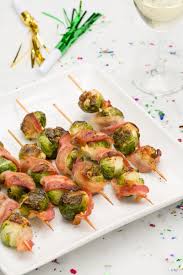 The best thanksgiving recipes guide you can find with over 100 tried and true recipes. Bacon Brussels Sprout Skewers Recipe Appetizer Recipes Healthy Thanksgiving Recipes Sprout Recipes