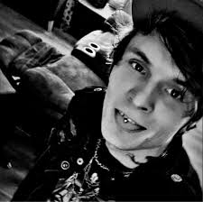 In velvet fog the gaslights softly bloom, A thousand stars behind a veil of  grime; The gutters sing, the alleyways presume To mask their sins in poetry  and rhyme. The whores wear