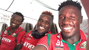 Archives Kahawa United captain, Patrick "Amin" Omuse (partly hidden),  introduces Harambee Stars defender, Amos Okech before an Inter-Forces  tournament at Kahawa Garrison in the1980s.