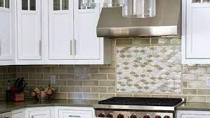A mosaic kitchen backsplash like the pink penny tile in this space by nimtim architects can be a really easy way to create a striking effect on your walls. Tile Backsplash Layout Fine Homebuilding