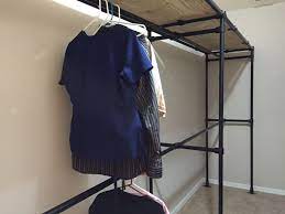 To install a closet rod support safely, you need to locate studs in plaster and lathe. 44 Diy Closet Ideas Built With Pipe Fittings Simplified Building