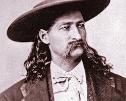 Image of Wild Bill Hickok, a legendary figure of the American West, known for his marksmanship and flamboyant personality, standing confidently with a Colt revolver in his hand