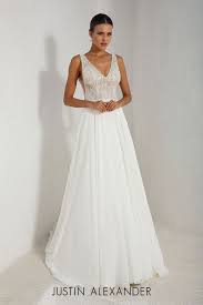 Clean Sheer Beaded Bodice Wedding Dress With Chiffon A Line Skirt Justin Alexander Wedding Dress Wedding Dress Inspiration Justin Alexander Bridal