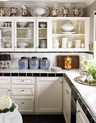 Everyone loves cute kitchen decorating themes and you are no exception. 35 Best Decorating Above Kitchen Cabinets Ideas Above Kitchen Cabinets Decorating Above Kitchen Cabinets Above Cabinets