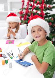 Maybe you would like to learn more about one of these? Kids Making Christmas And Seasonal Greeting Cards In Front Of The Decorated Tree Stock Photo Picture And Royalty Free Image Image 16522861