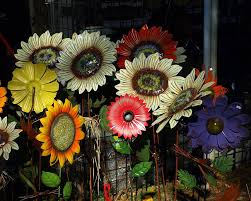 Even though the billowy flowers slow during the heat of summer, they come barreling back as the weather. Painted Metal Flowers Photograph By Mike Stanfield