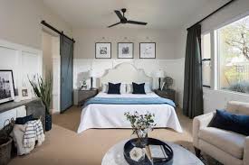 Whether in the kitchen , bathroom , or living room, rustic decor looks good in any room. Rustic Contemporary Master Bedroom With Blue And White Accents And Upholstered Headboard Hgtv