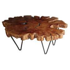 A beautiful crosscut of a large yew tree that rests on a hexagonal frame nested with roses really is an eye catcher. Yew Wood Coffee Table Coffee Table Wood Yew Wood Coffee Table