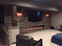 50% fiberglass, 50% stone with plastic foot glides on base; Natural Stone Tv Wall Novocom Top