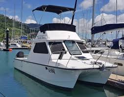 Research the new 2016 world cat boats. Shark Cat Flybridge 9 6m Shark Cat Power Boats Boats Online For Sale Fibreglass Grp Boats Online