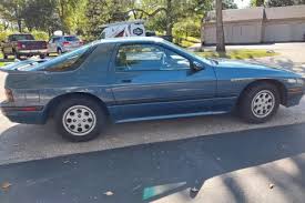 Image result for Phoenix Blue 1975 Mazda