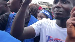 Masked dancer performing in Nimba County as Liberian musician Bucky Raw  sang 🤣