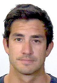 Man convicted of firing gun in bar admits violating probation