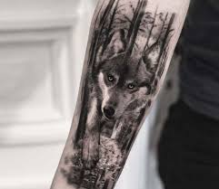 Black And Grey Realism Wolf Tattoo Wolf In Forest Tattoo By Bro Studio Post 18833 Forest Tattoos Wolf Tattoo Sleeve Grey Wolf Tattoo