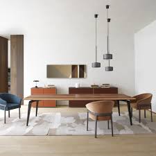 The larine extendable dining table is designed with the clever engineering that often turns up in with this extendable dining table, you get both a compactly proportioned table, suitable for kitchen it's a nice table. Modern Dining Tables Ligne Roset Contemporary Design Furniture
