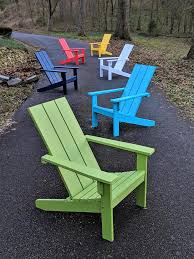 Includes 2 adirondack chairs and 1 end table. Evergreen Patio