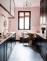 Dark hardwood floors also work to anchor the room. 5 Ideas To Be Creative With Your Grey Kitchen Cabinet Talkdecor Pink Kitchen Walls Grey Kitchen Cabinets Pink Kitchen Cabinets