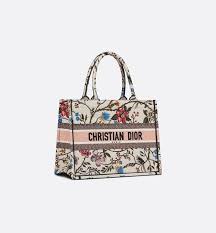 Small Multicolor Rosa Mutabilis Embroidered Dior Book Tote Bags Women S Fashion Dior In 2020 Christian Dior Bags Dior Bag Book Tote Bag Beige and maroon toile de jouy embroidered canvas christian dior book tote with dual rolled top handles, embroidered logo at front, tonal canvas interior and open top. embroidered dior book tote bags