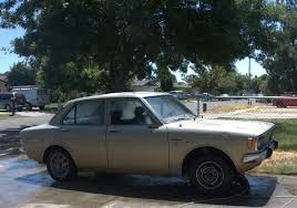 Image result for Gold Dark 1972 Crown