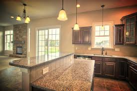 The Large Open Kitchen With Adjoining Breakfast Area Includes An Island With A Rai Kitchen Island Shapes Kitchen Island With Granite Top Breakfast Bar Kitchen