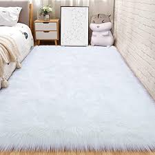Orbit faux fur chair with cushions looks incredibly comfortable and inviting. Amazon Com Andecor Soft Fluffy Faux Fur Bedroom Rugs 3 X 5 Feet Indoor Wool Sheepskin Area Rug For Girls Baby Living Room Chair Sofa Home Decor Floor Carpet White Home Kitchen