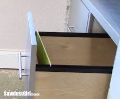 These storage solutions make it simple to hang folders inside the file drawers of computer desks so you can easily retrieve what you need. File Folder Drawer For Hanging Files Sawdust Girl