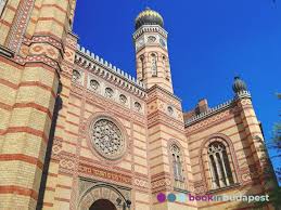 From ancient greek συναγωγή, synagogē, 'assembly'; Dohany Street Synagogue