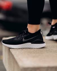 A black nike react foam midsole and rubber outsole with hints of pink adds for durable cushioning, while teal wraps the tpu heel clip to give off that south beach. Nike Epic React Flyknit 2 Women S Running Shoe Nike Gb