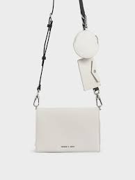 Find classic and modern styles made from genuine leather and exquisite craftsmanship. White Multi Pouch Crossbody Bag Charles Keith Ph