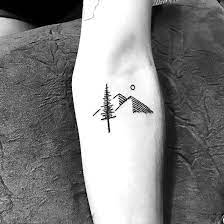 Small geometric tattoos are unique. Simple Black Tree Tattoo Idea Small Tattoos For Guys Mountain Tattoo Simple Tattoos