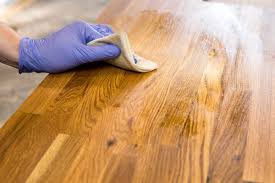 This will work perfectly in a large kitchen where you can hang mason jars on wooden boards to grow herbs. All About Wood Countertops This Old House